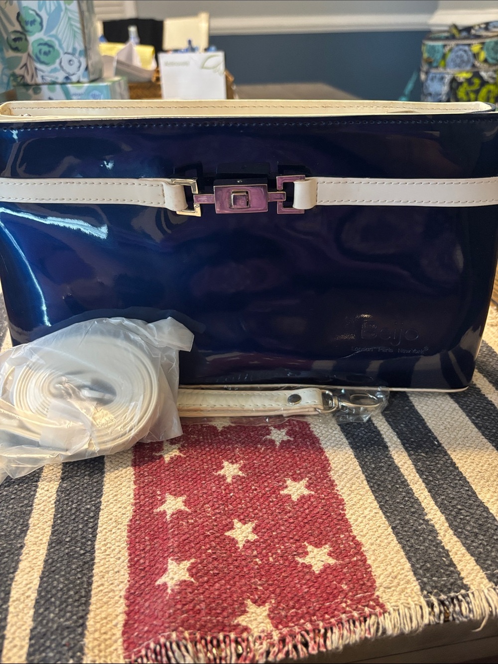 Beijo Navy Patent Wristlet Clutch with White Trim and crossbody strap